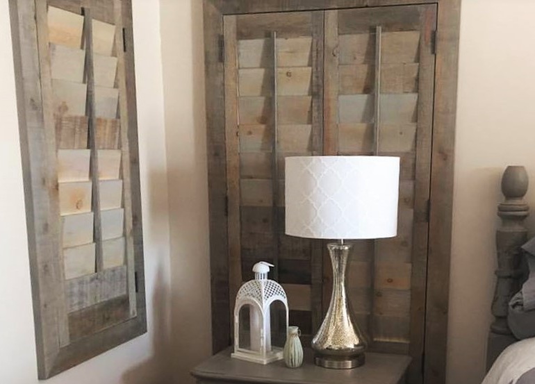 Boston bedroom with repurposed wood shutters.